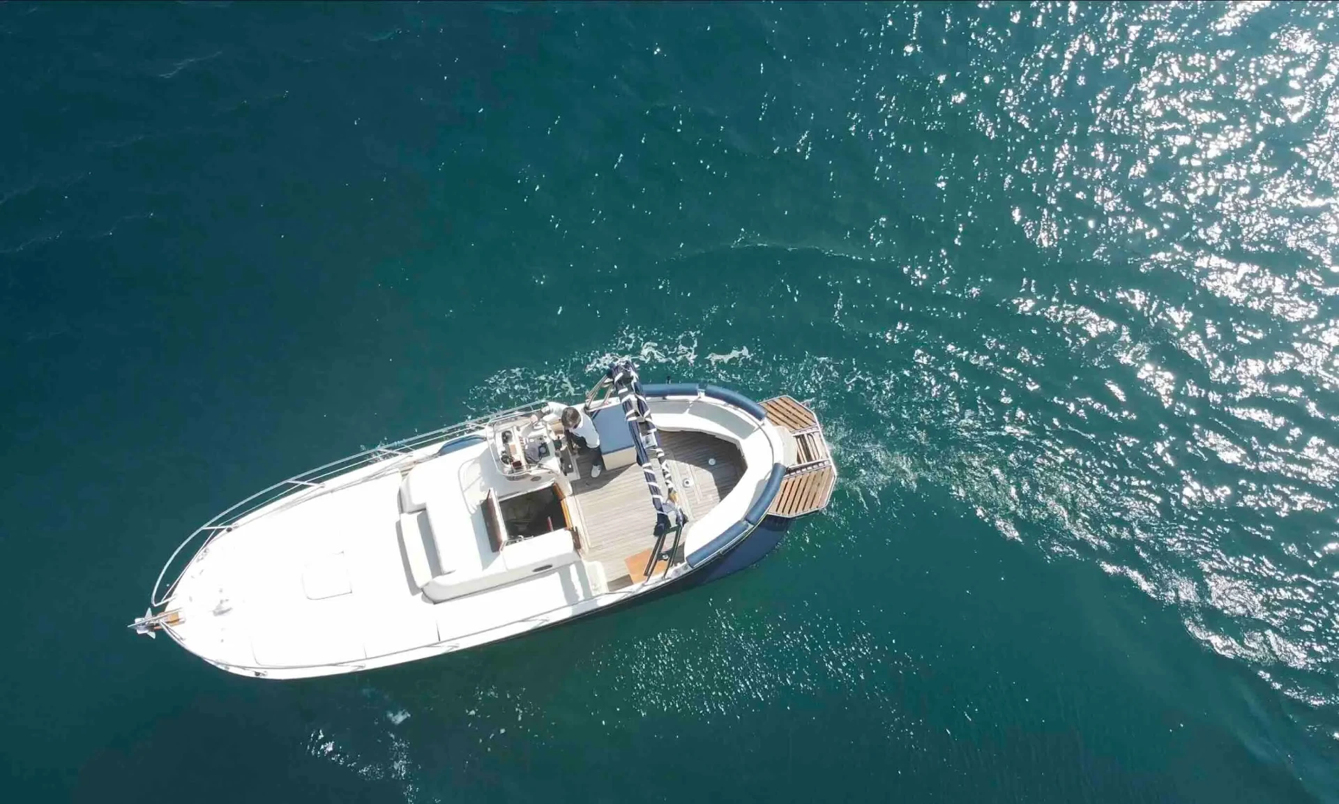 Aerial view of the Libeccio 7.5 motor boat cruising the Costa Brava coastline