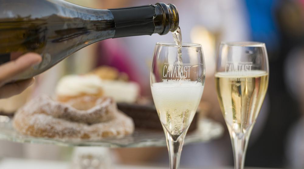 Cava being poured into tasting glasses during a Penedès cava tasting near Barcelona